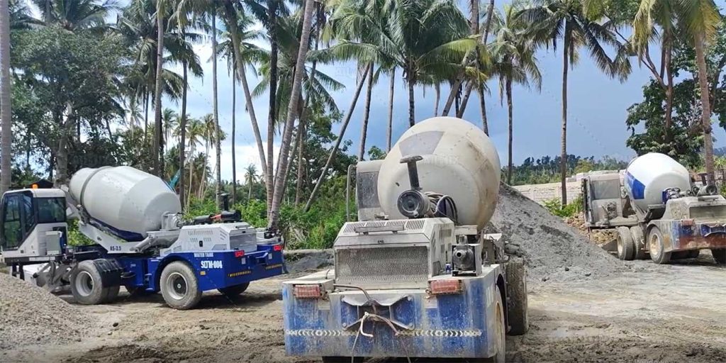 self loading concrete mixer machine